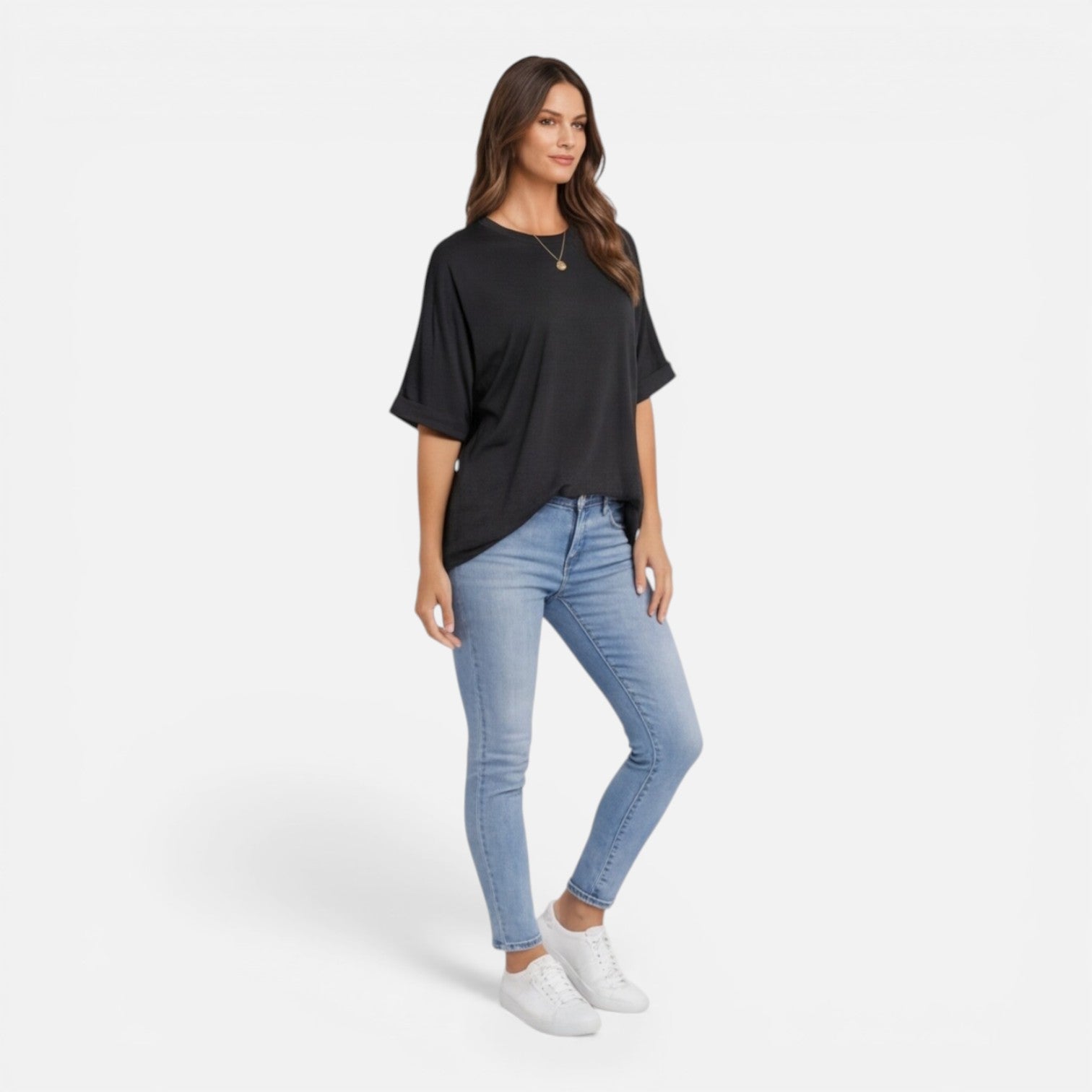 Women’s oversized cotton T-shirt by My Store, relaxed fit, lightweight, breathable daily wear shirt modeled on a woman.