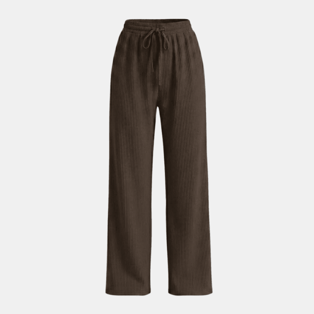 Women’s plissé wide-leg trousers by Tammy Bradley, stylish and flowy pants with a relaxed fit and elegant pleated design.