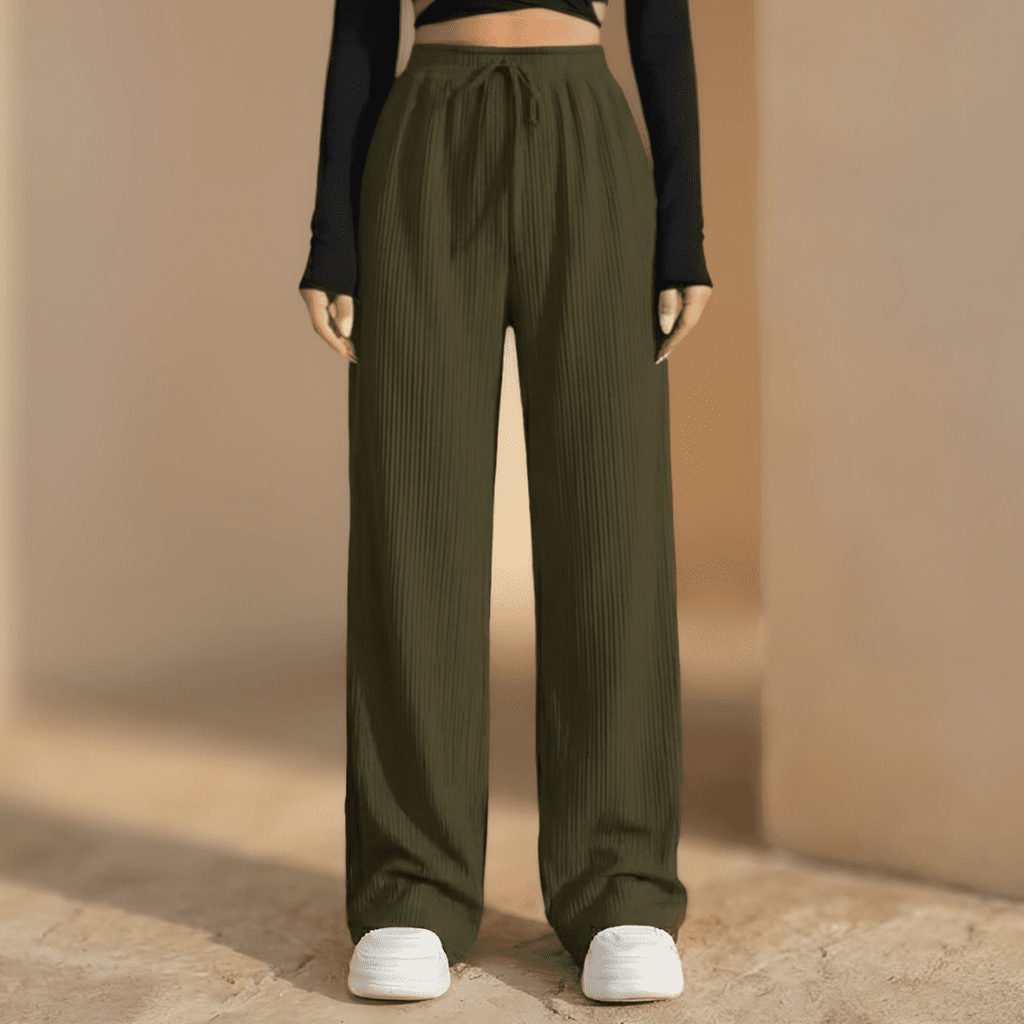 Women’s plissé wide-leg trousers by Tammy Bradley, showcasing flowing fabric and relaxed fit in a stylish wide-leg design.