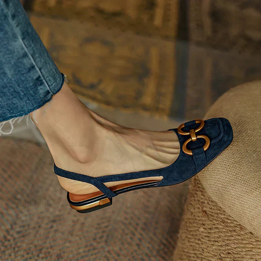 Women's orthopedic sandals with adjustable buckle strap and arch support, featuring cushioned footbed and open-toe design.