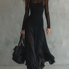 Elegant women's maxi dress made of flowy tulle, featuring a stylish design perfect for special occasions.