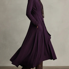 Yellow high-neck summer maxi dress for women with long sleeves, stylish and flowy, perfect for warm weather occasions.