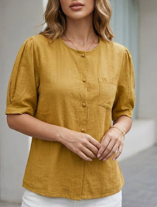 Yellow women's summer blouse with short sleeves, linen fabric, and front pockets, perfect for casual warm-weather wear.