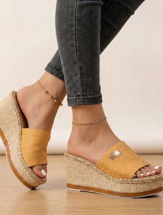 Yellow women's orthopedic espadrilles with wedge heel and adjustable strap, stylish and comfortable for everyday wear.