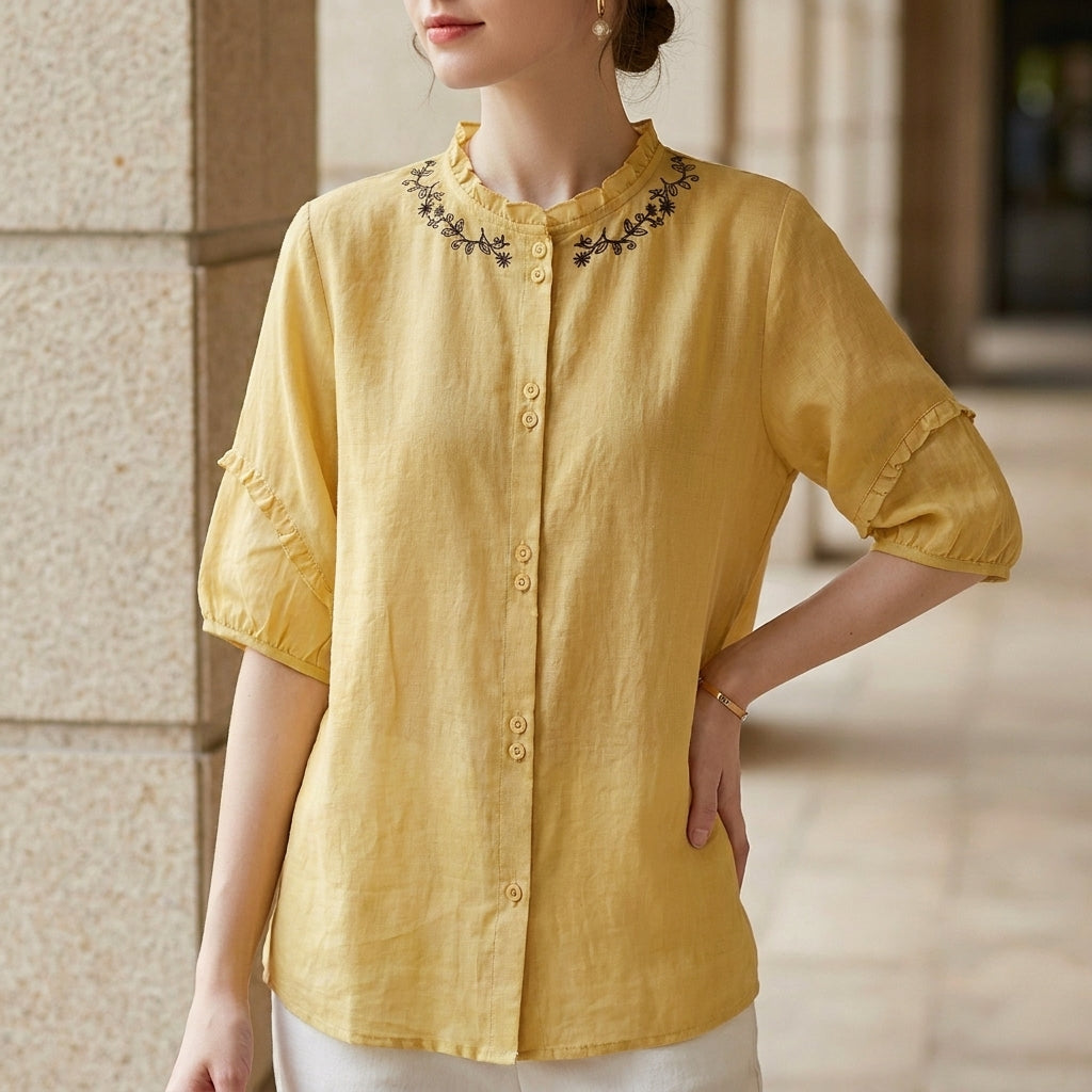 Yellow linen summer blouse for women with ruffle details, lightweight top perfect for warm weather and casual stylish outfits.
