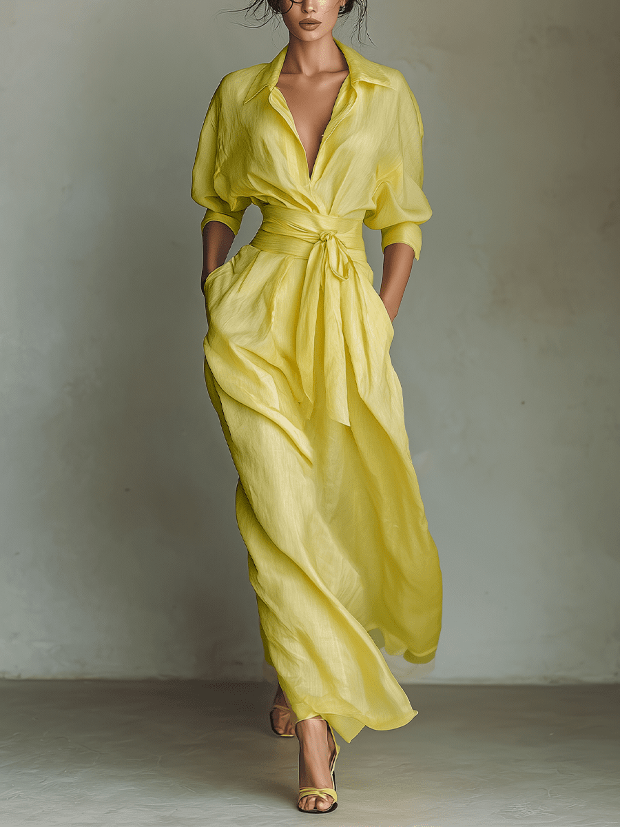 Yellow linen maxi dress for women by Tammy Bradley showing a flowy, sleeveless design with a V-neck and ankle-length silhouette.