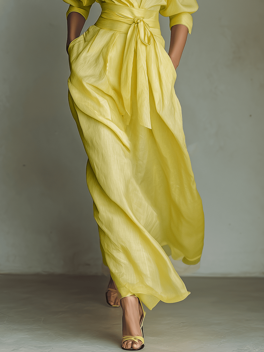 Yellow linen maxi dress for women by Tammy Bradley, flowing sleeveless design with a relaxed fit and maxi length.