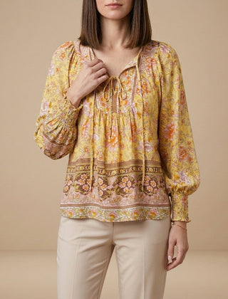 Yellow floral long sleeve linen blouse for women, lightweight summer top with a relaxed fit and feminine design.