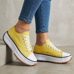 Yellow orthopedic women's sneakers with lace-up design, providing comfortable support and stylish footwear by My Store.