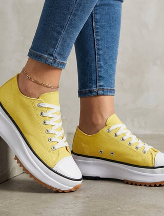 Yellow orthopedic women's sneakers with lace-up design, providing comfortable support and stylish footwear by My Store.