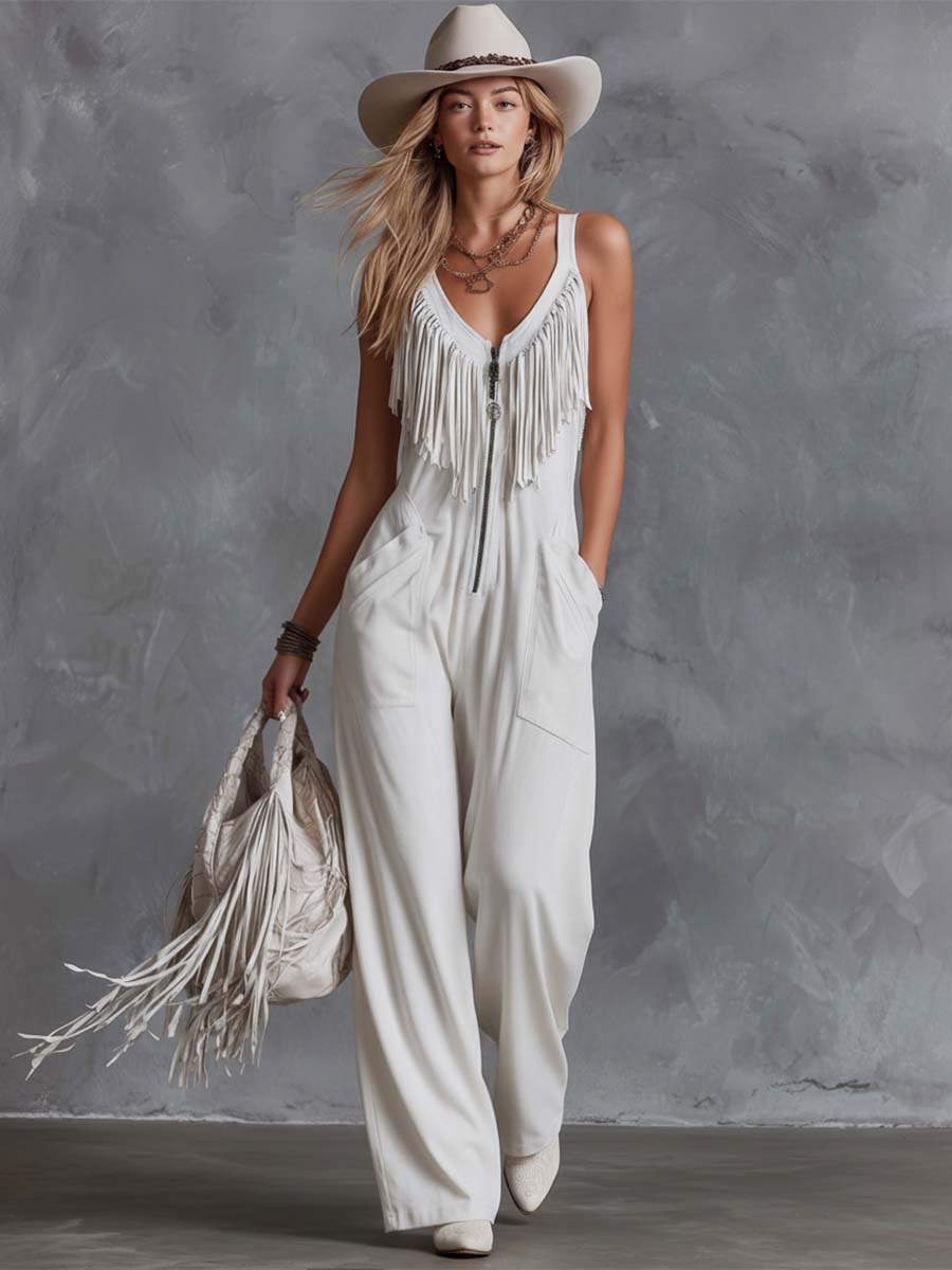 White faux suede Western fringe V-neck jumpsuit for women, featuring stylish fringe details and a V-neck design.