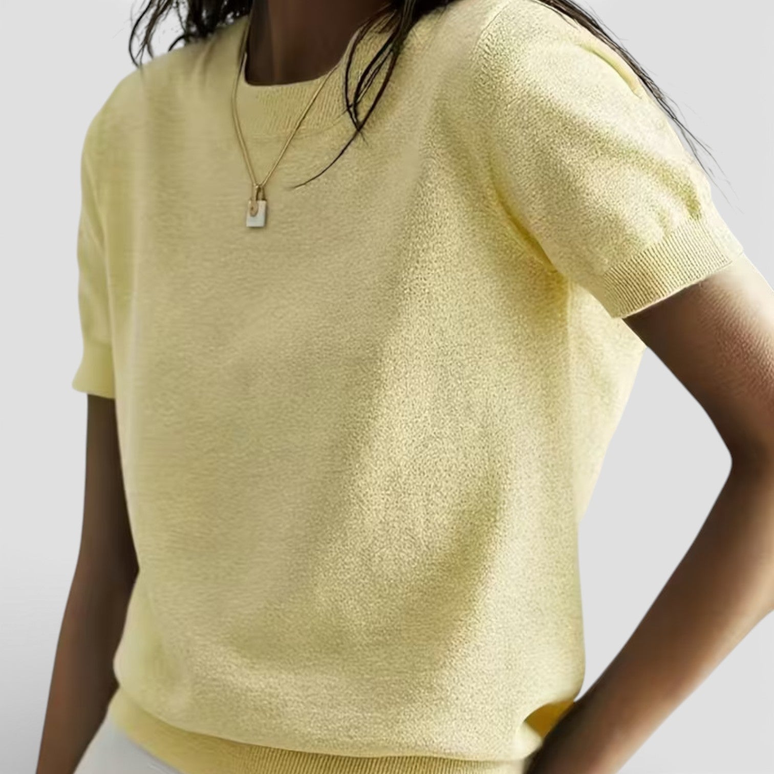 Women's knit top made of wool blend, comfortable classic fit, stylish women's shirt featuring a cozy, versatile design.