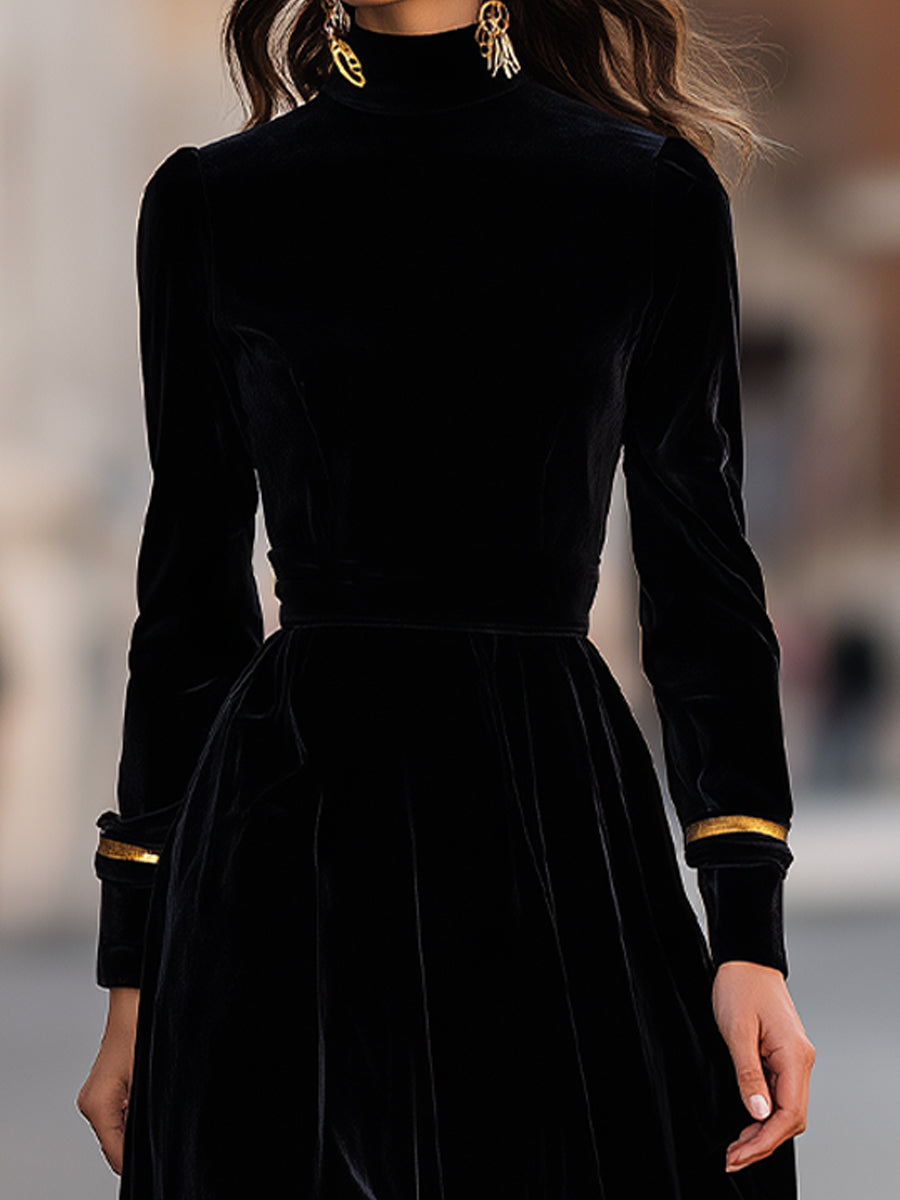 Elegant velvet midi dress with gold trim, stylish and sophisticated, featuring a fitted silhouette and luxurious fabric.