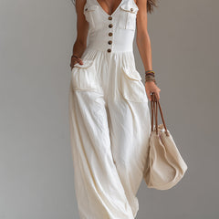 White sleeveless wide-leg jumpsuit with patch pockets, women's pants by My Store, shown on a model.