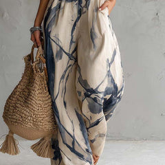 White ink wash print wide-leg jumpsuit with halter neck and pockets, women's pants by My Store, displayed on a model.