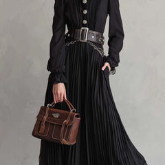 Vintage lace-hem pleated midi dress with button details, showcasing a classic, elegant design perfect for stylish occasions.