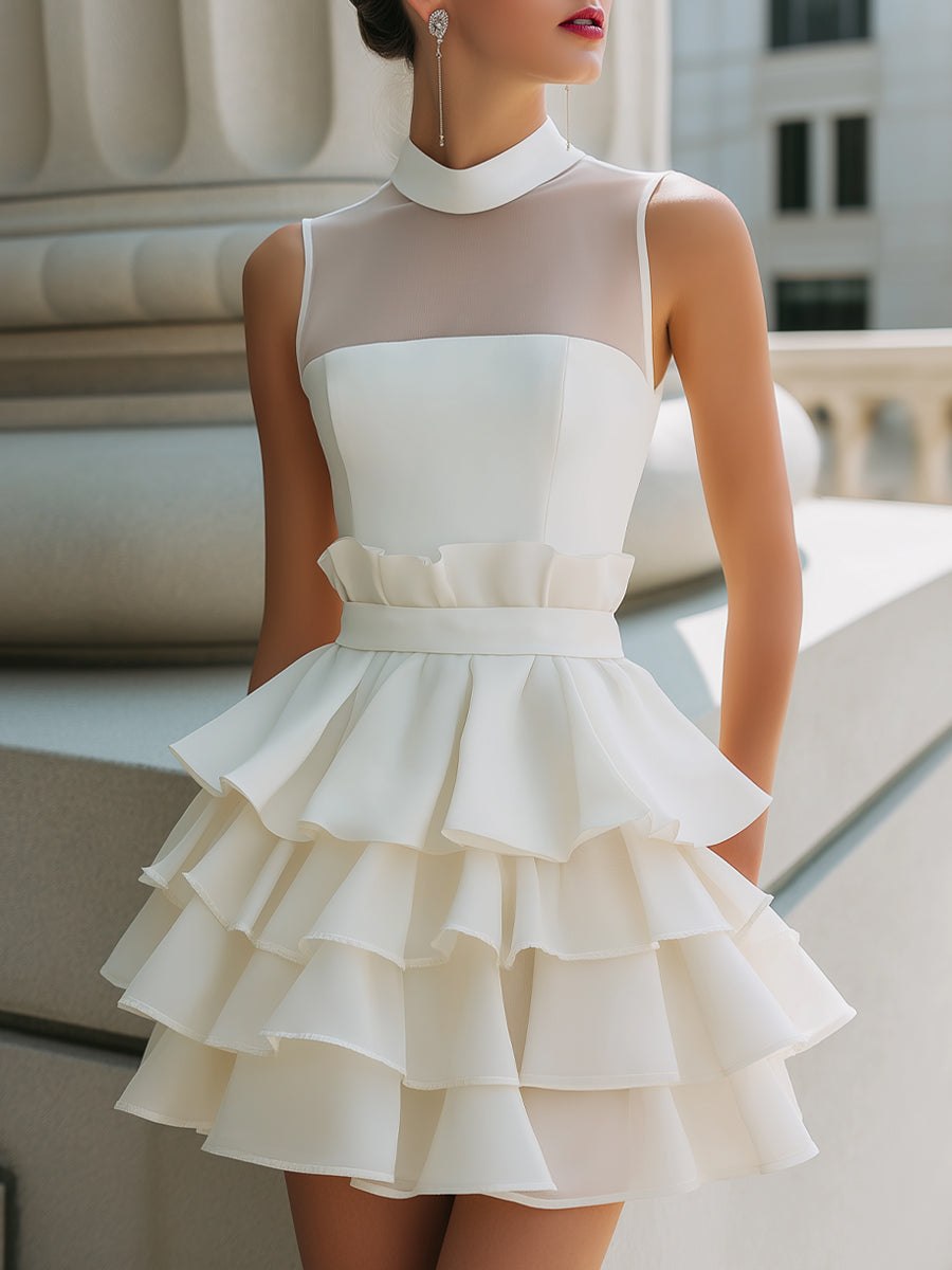 High-neck sheer-yoke tiered ruffle mini dress for women by Tammy Bradley, featuring layered ruffles and a stylish silhouette.