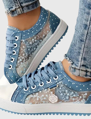 Breathable cushioned orthopedic sneakers for women with supportive design, featuring breathable fabric and comfortable sole.