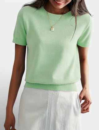 Women's knit top made of wool blend, featuring a comfortable fit and classic style, perfect for casual wear.