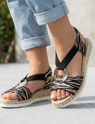 Black Tammy Bradley peep-toe wedge sandals for women with ankle straps and open toes, stylish and comfortable for summer wear.