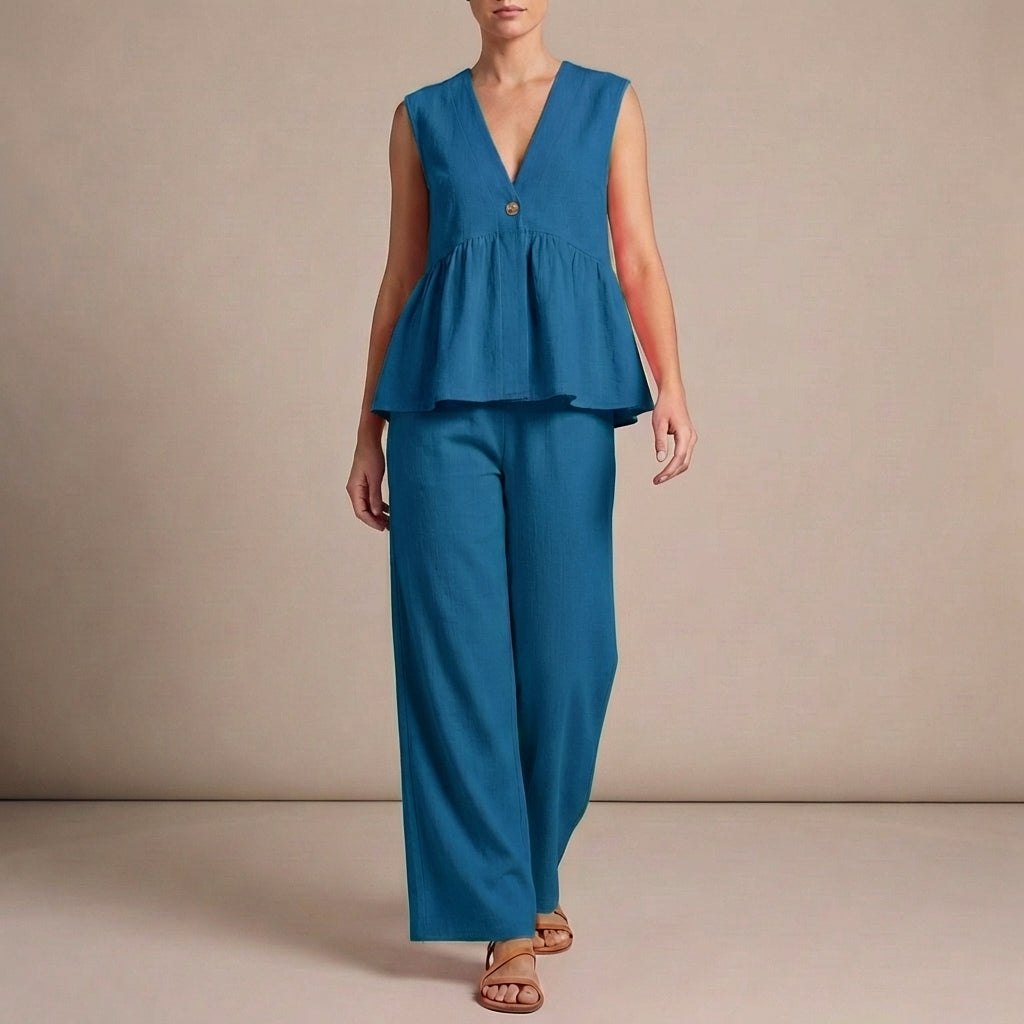 Blue women's V-neck wide-leg two-piece co-ord set by Tammy Bradley, featuring a fitted top and flowing pants.