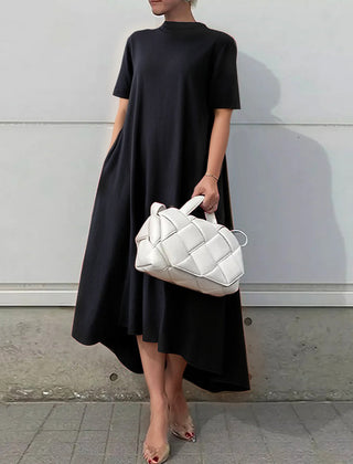 White high-low maxi dress with short sleeves from My Store, featuring a solid color design and flowing fabric.