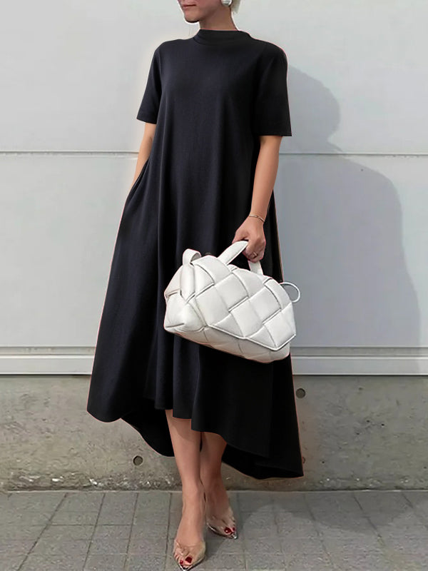 White high-low maxi dress with short sleeves from My Store, featuring a solid color design and flowing fabric.