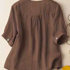 Light beige V-neck linen summer blouse for women, flowy and casual, perfect for warm weather and relaxed styles.