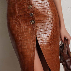 Caramel croc-embossed faux leather midi dress with a fitted silhouette, stylish and elegant for versatile occasions.