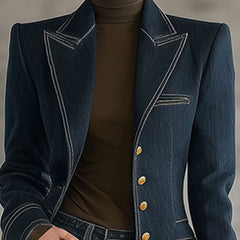 Navy topstitched denim jacket for women featuring classic design, visible stitching, and a fitted style, ideal for casual wear.