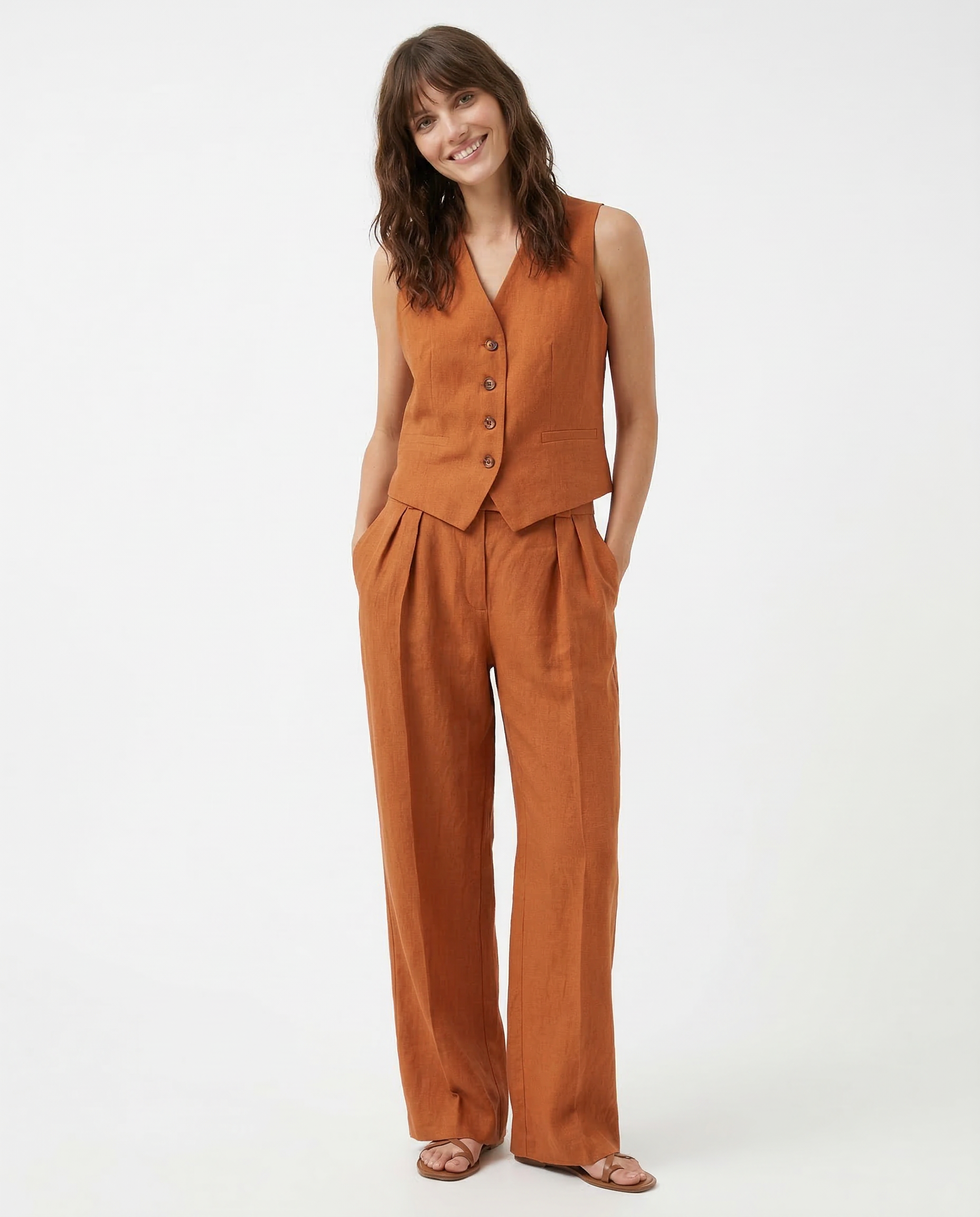 White women's wide-leg linen trousers with high waist, stylish and comfortable pants for casual or formal wear.