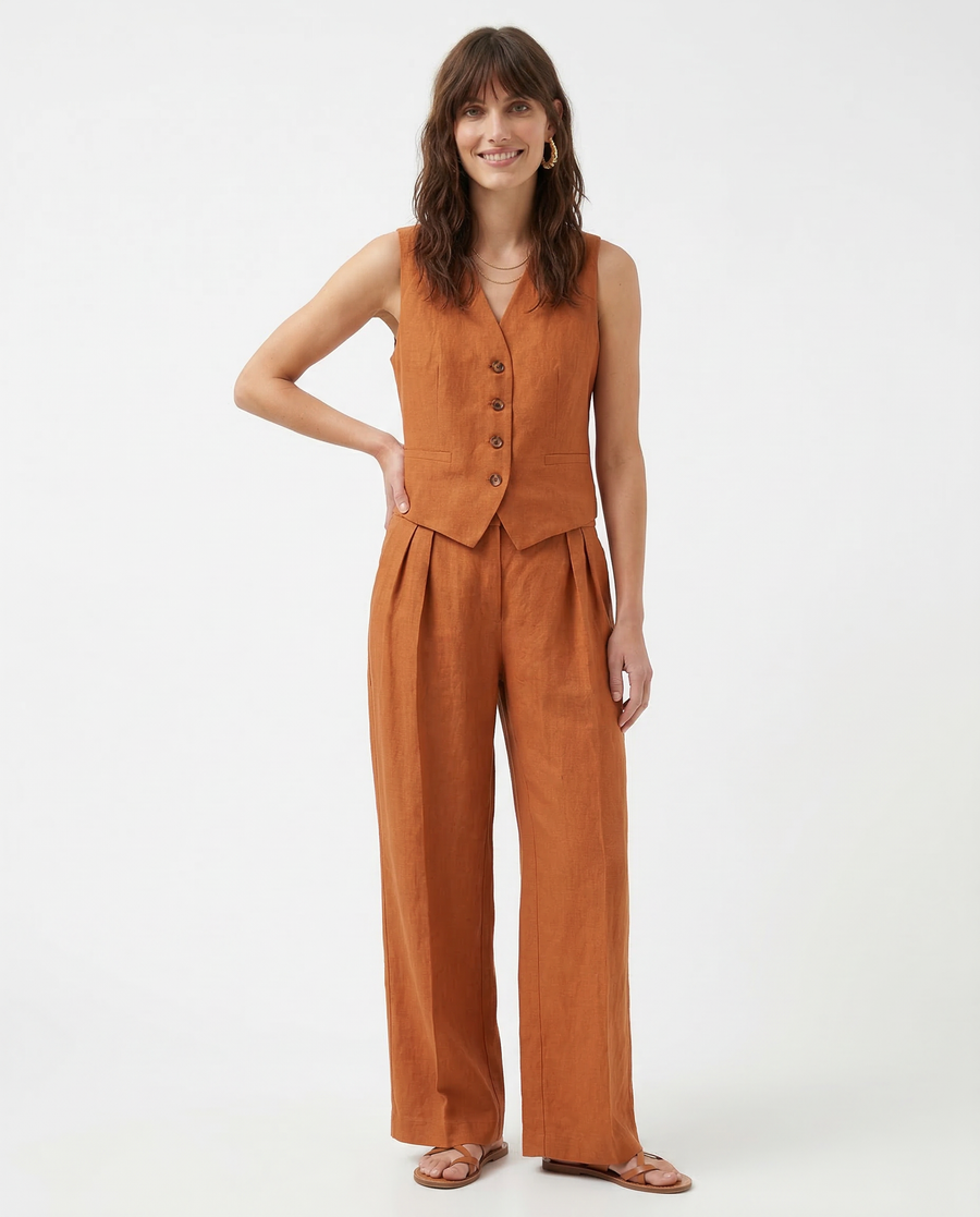 White women's wide leg linen trousers with high waist, relaxed fit, and stylish design, perfect for casual or summer wear.