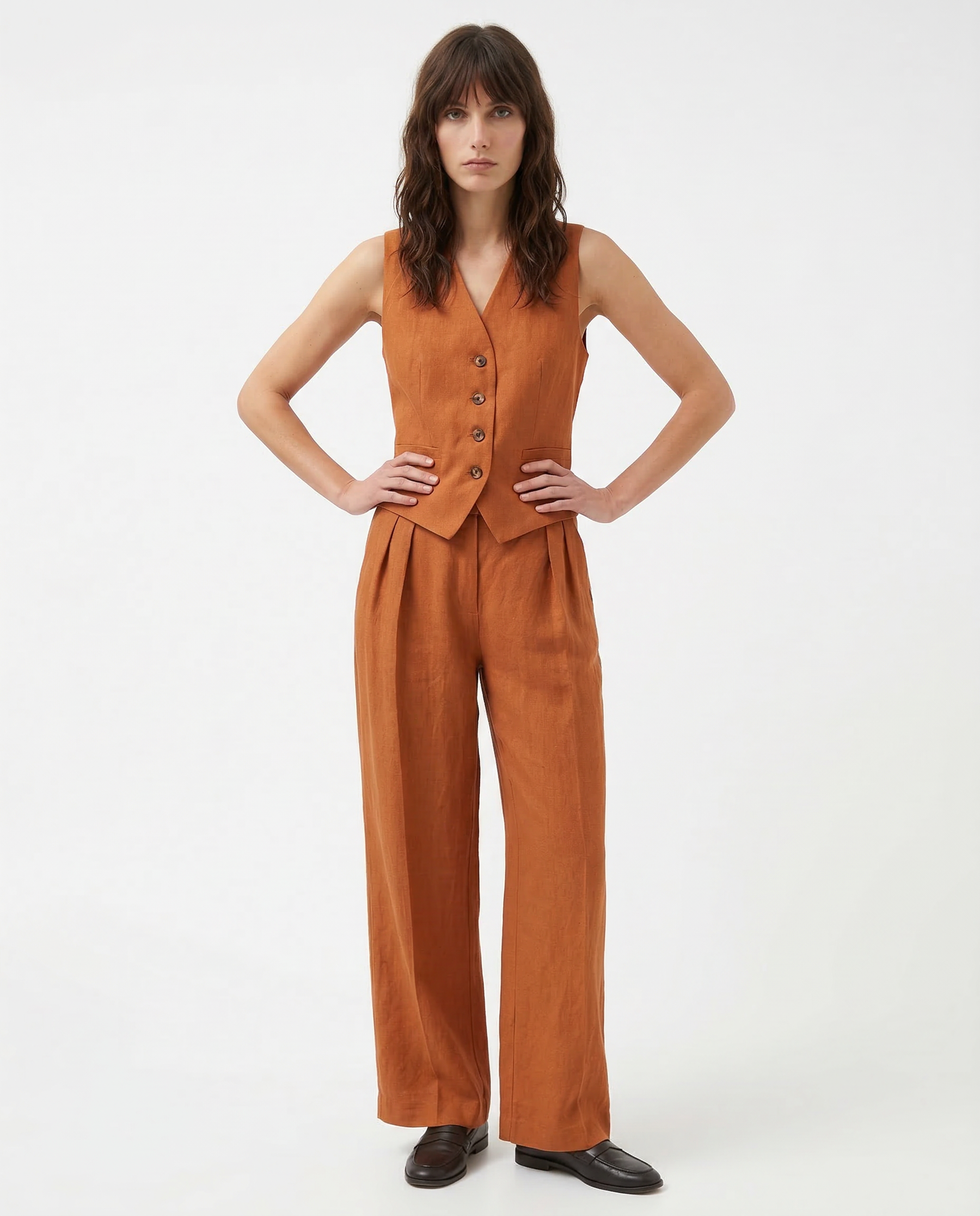White women's wide-leg linen trousers with high waist, stylish and breathable pants perfect for casual or chic outfits.