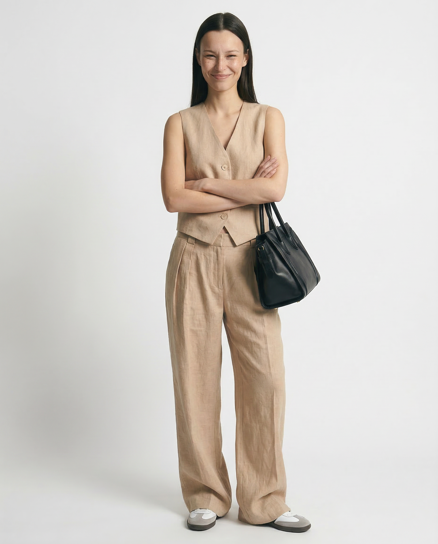 White women's wide leg linen trousers with high waist and relaxed fit, perfect for casual or chic summer outfits.