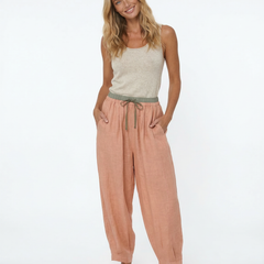 Tapered linen trousers for women, loose pull-on pants in a relaxed fit, made from lightweight linen fabric.