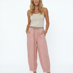 Light beige tapered linen trousers for women, loose pull-on style, casual and breathable pants.