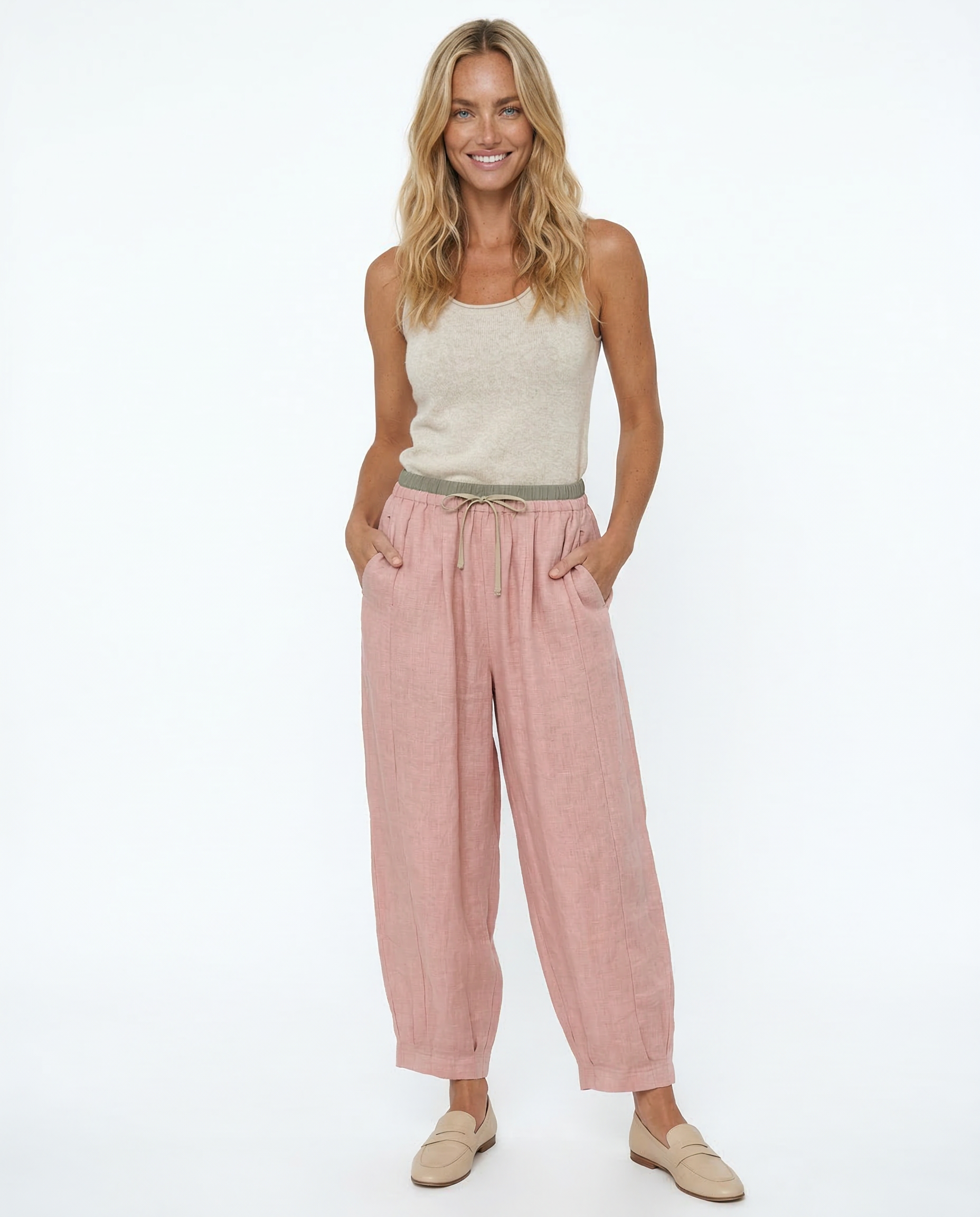 Light beige tapered linen trousers for women, loose pull-on style, casual and breathable pants.