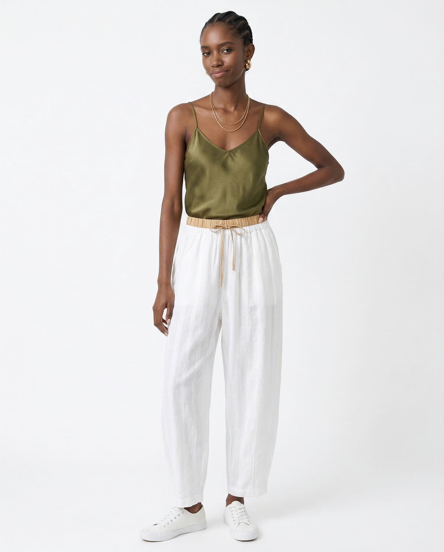 Beige tapered linen trousers for women, loose pull-on style, stylish and comfortable casual pants.