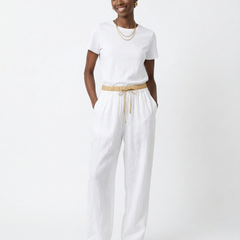 Light beige tapered linen trousers for women, loose pull-on style, casual and comfortable pants with relaxed fit.
