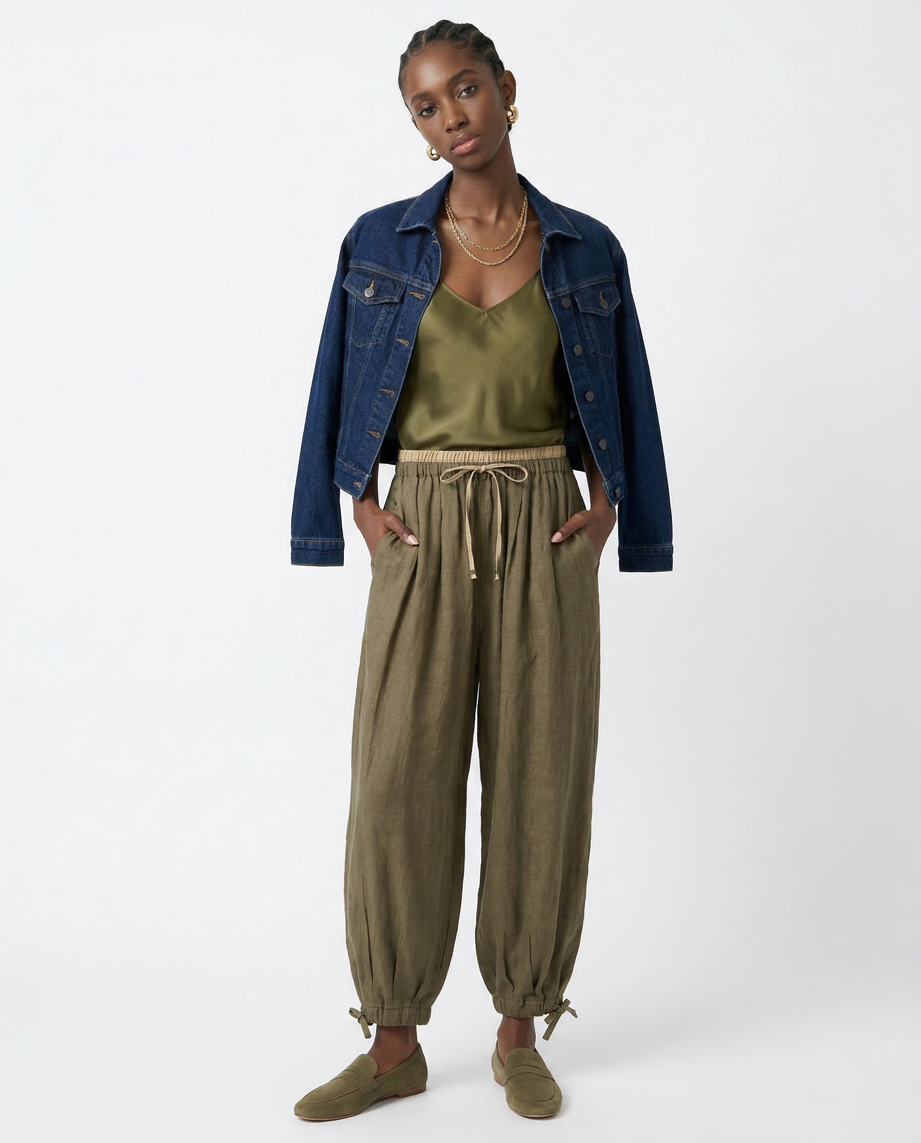 Beige tapered linen trousers for women, loose pull-on pants with relaxed fit, stylish and comfortable for casual wear.