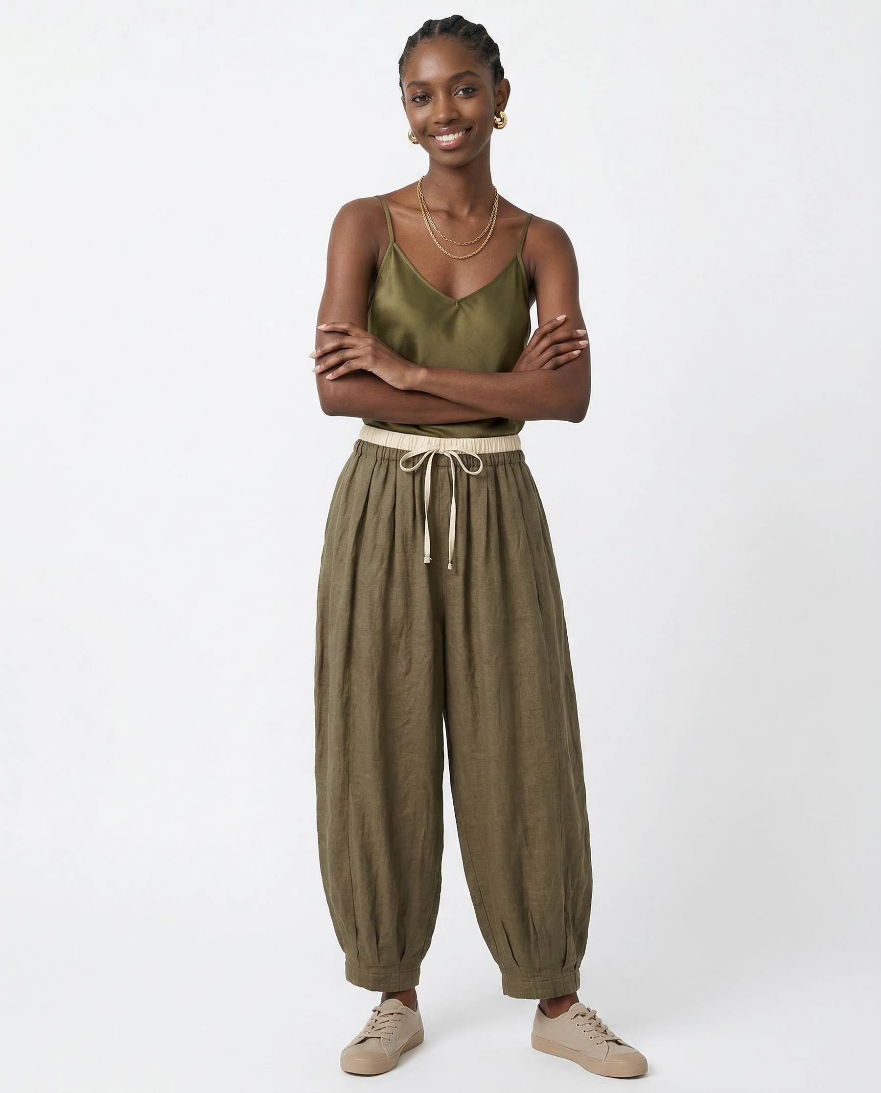 Beige tapered linen trousers for women, loose pull-on pants with a relaxed fit, stylish and comfortable for everyday wear
