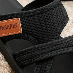 Orthopedic women’s open-toe slippers with a heel, featuring cushioned soles and supportive design for comfortable wear.
