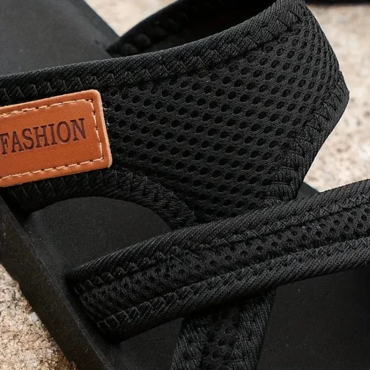 Orthopedic women’s open-toe slippers with a heel, featuring cushioned soles and supportive design for comfortable wear.