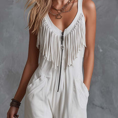 White faux suede western fringe v-neck jumpsuit for women, featuring wide-leg pants with fringe accents and a stylish v-neck design.