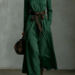 Color-blocked belted high-neck long-sleeve maxi dress with casual style, featuring vibrant color accents and a relaxed fit.