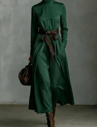 Color-blocked belted high-neck long-sleeve maxi dress with casual style, featuring vibrant color accents and a relaxed fit.