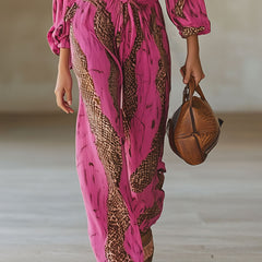 Rose red leopard print chiffon long sleeve jumpsuit for women, stylish and flowy pants with a bold animal pattern.