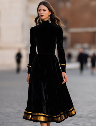 Elegant velvet midi dress with gold trim, stylish women's dress featuring a sophisticated design and luxurious fabric.