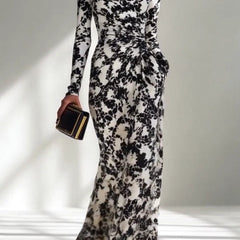 Black and white color-blocked printed maxi dress with long sleeves, pocket details, slim fit, and pleated design by My Store.