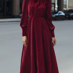 Burgundy velvet pleated bow-neck midi dress by My Store, featuring a stylish cocktail dress design with elegant pleats and a bow neckline.
